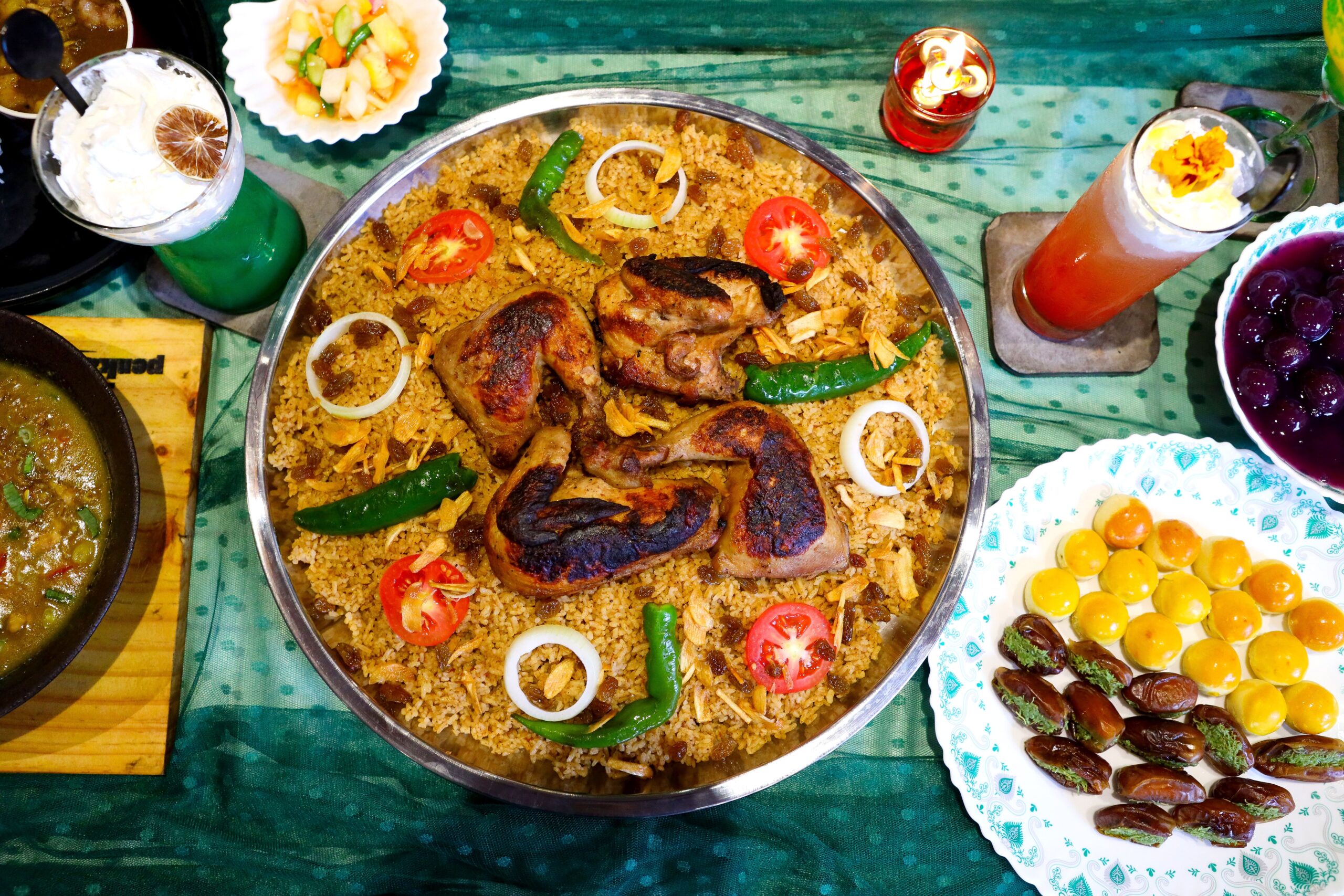 pexels photo 36639894 36639894 Rich display of Indonesian cuisine, showcasing traditional grilling and vibrant beverages.
